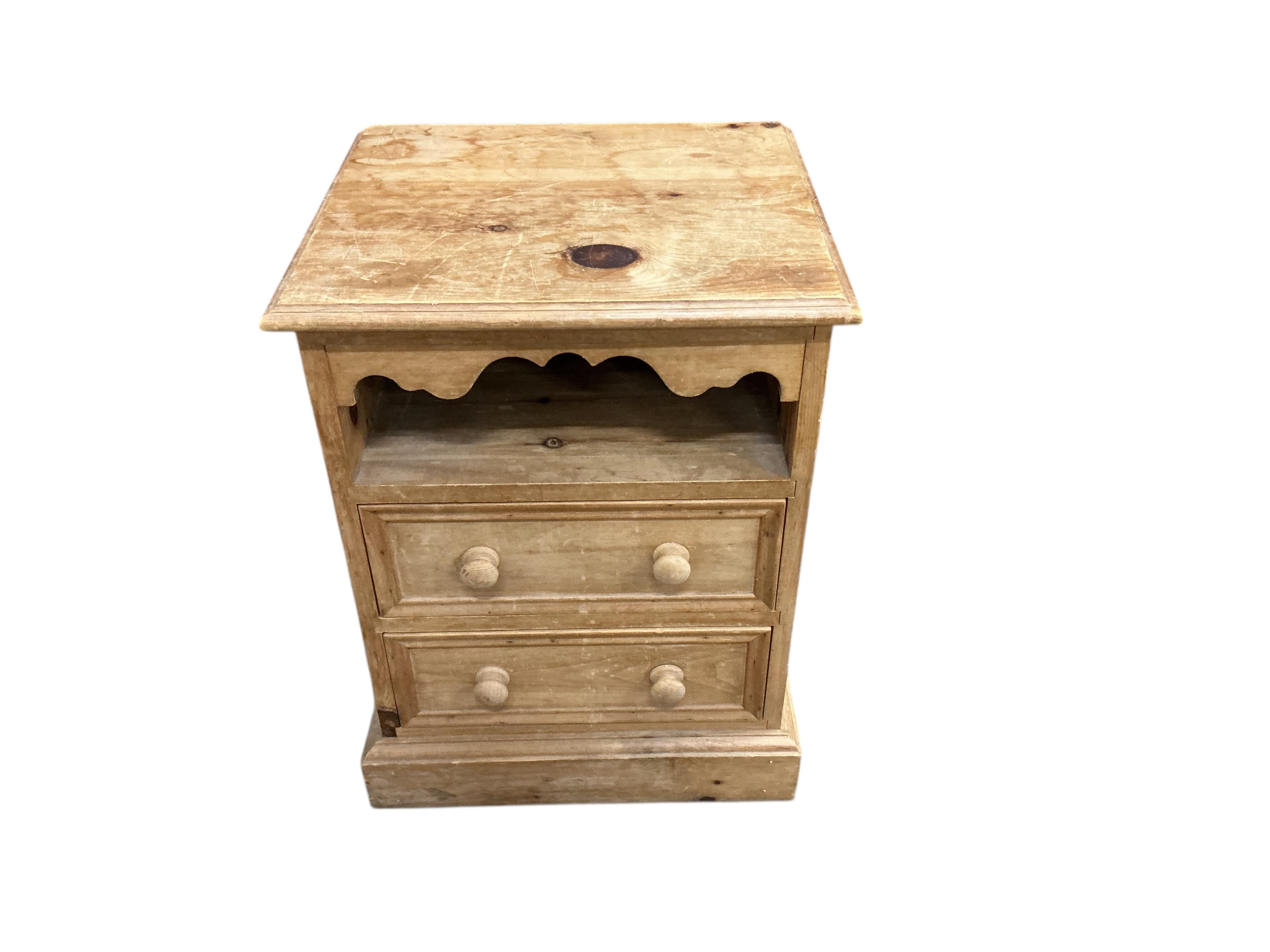 A small Victorian style pine chest, width 85cm, depth 42cm, height 76cm together with two pine bedside cabinets